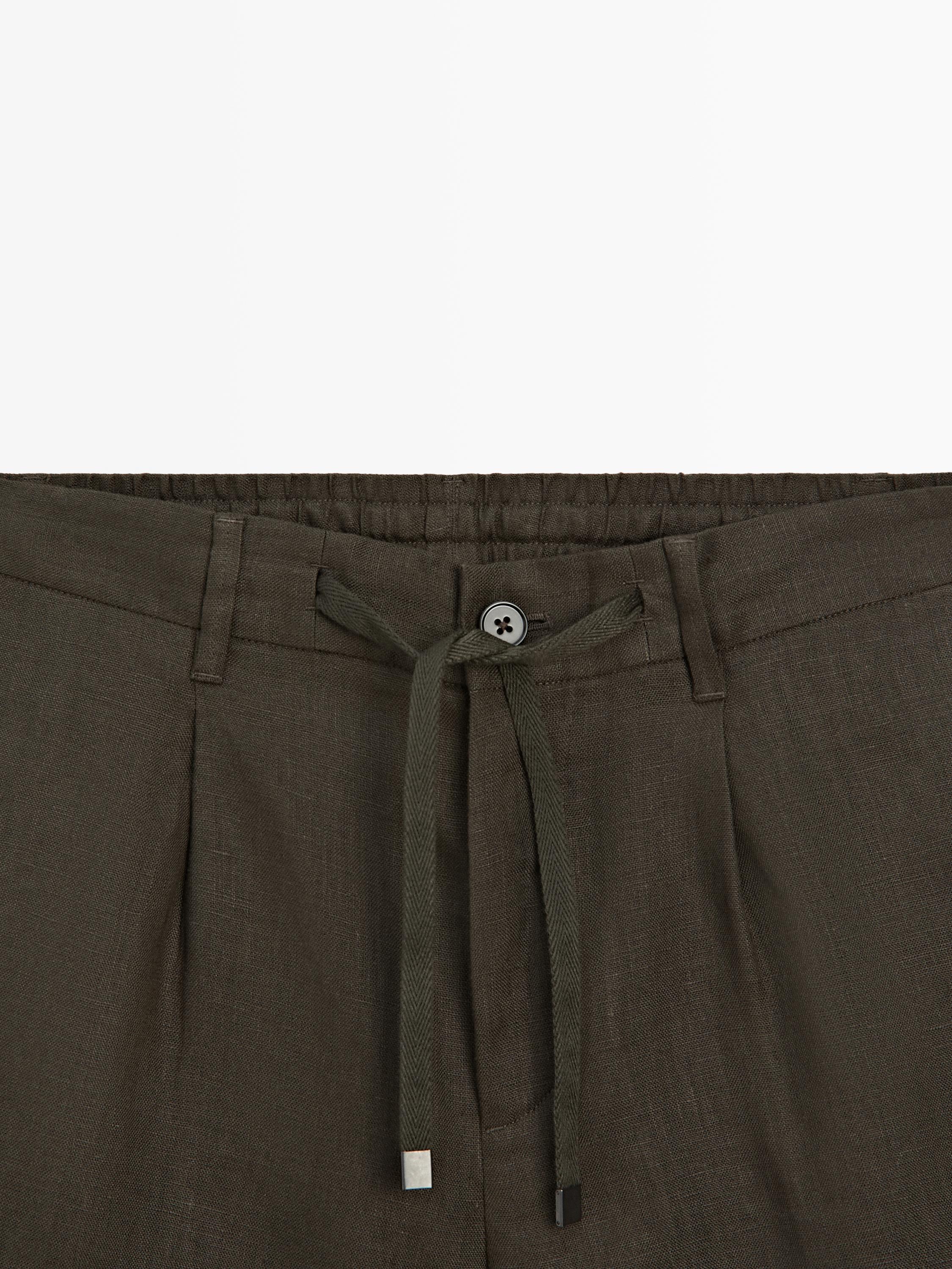 Total look linen Bermuda shorts with elasticated detail